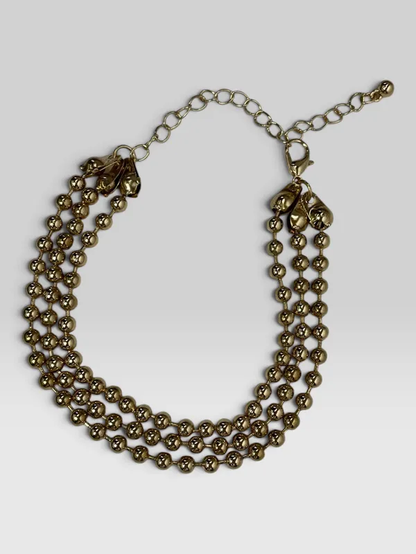 Pulsera triple dorado