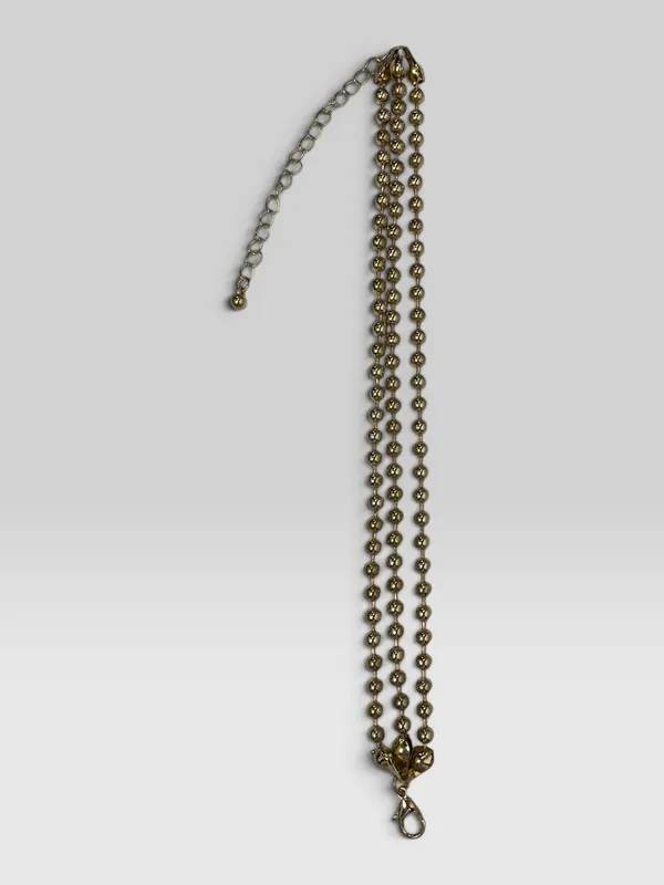 Pulsera triple dorado