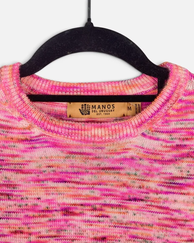 Buzo rosado manos del uruguay
