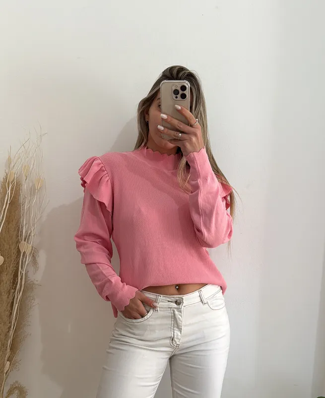 Buzo rosado con vuelos talle xl