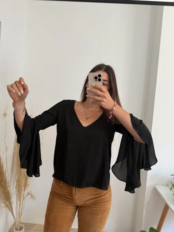 Blusa negra mangas anchas talle s zara