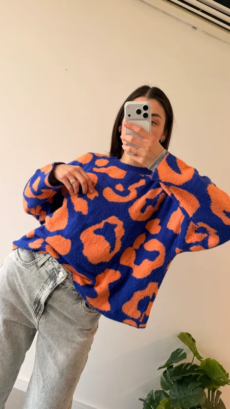 Buzo indian naranja y azul talle s