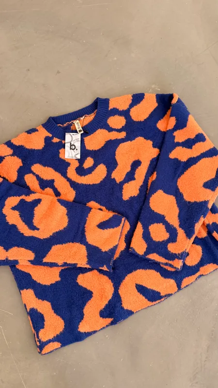 Buzo indian naranja y azul talle s