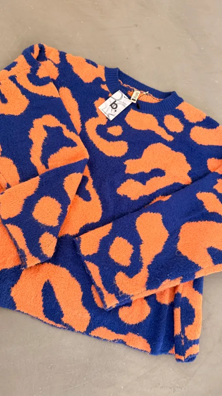 Buzo indian naranja y azul talle s
