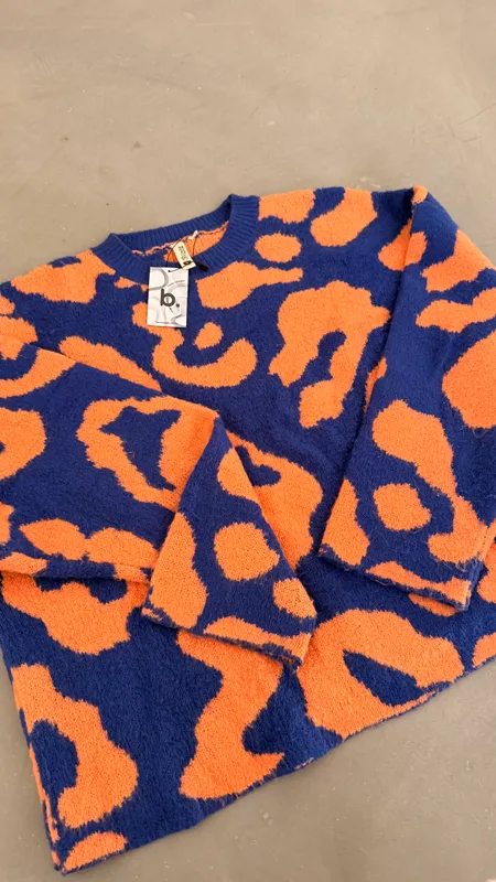 Buzo indian naranja y azul talle s