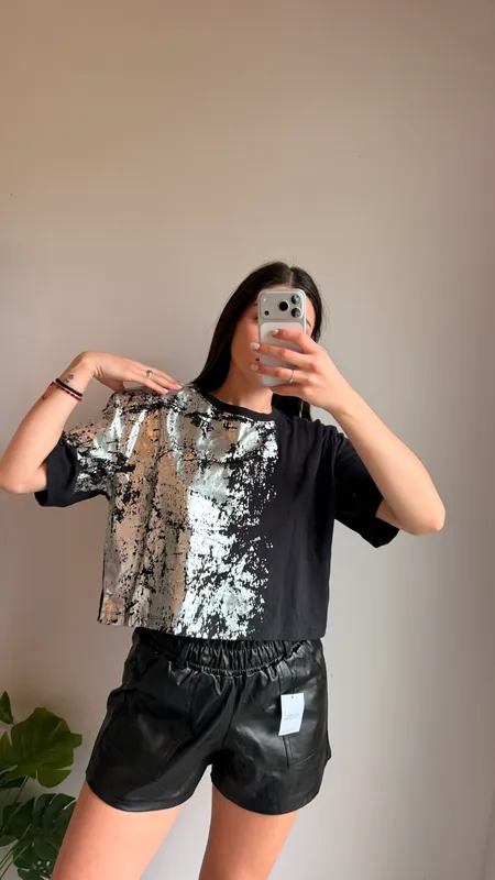 Remera negra con plateado mistral talle m