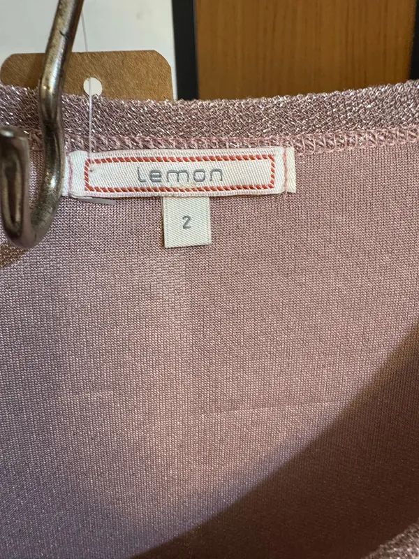 Blusa metalizada rosada