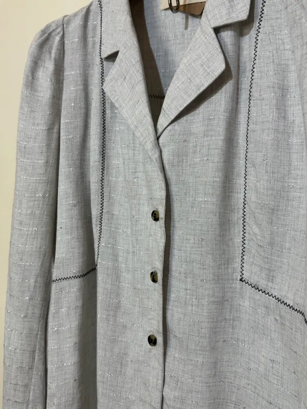 Saco gris con hilos plateados