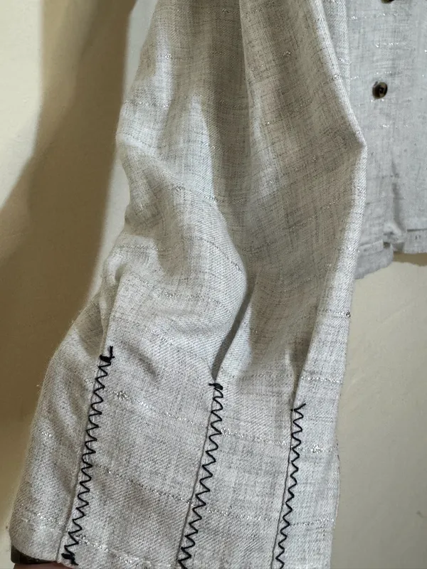 Saco gris con hilos plateados