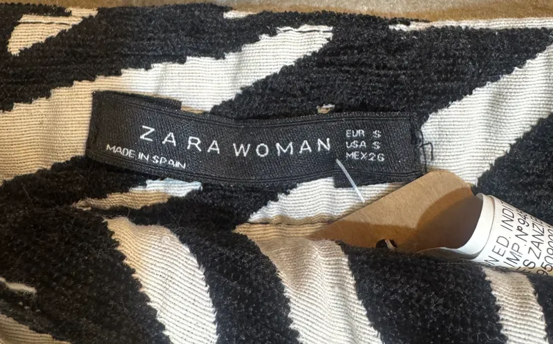 Mini falda tela con bolsillos cebra