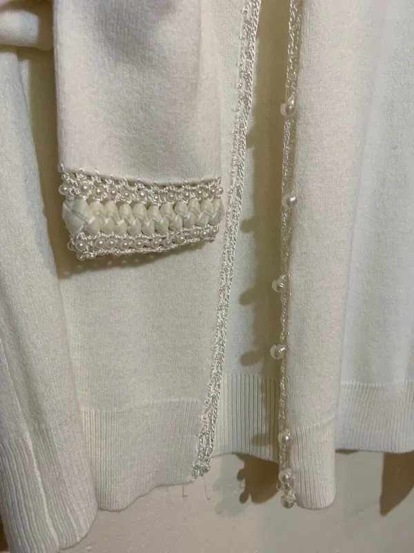 Saquito blanco perlitas