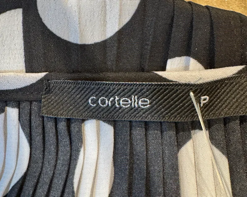 Blusa lunares blancos