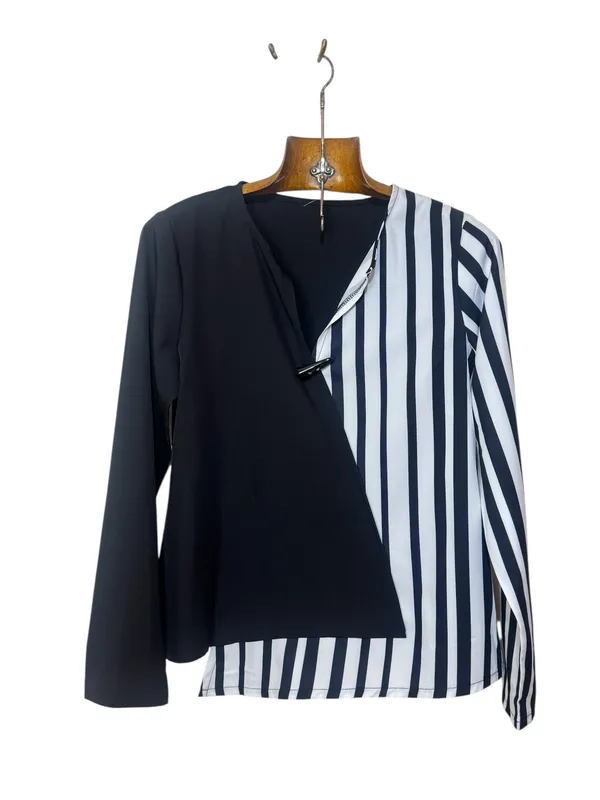 Blusa cruzada blanca y negra