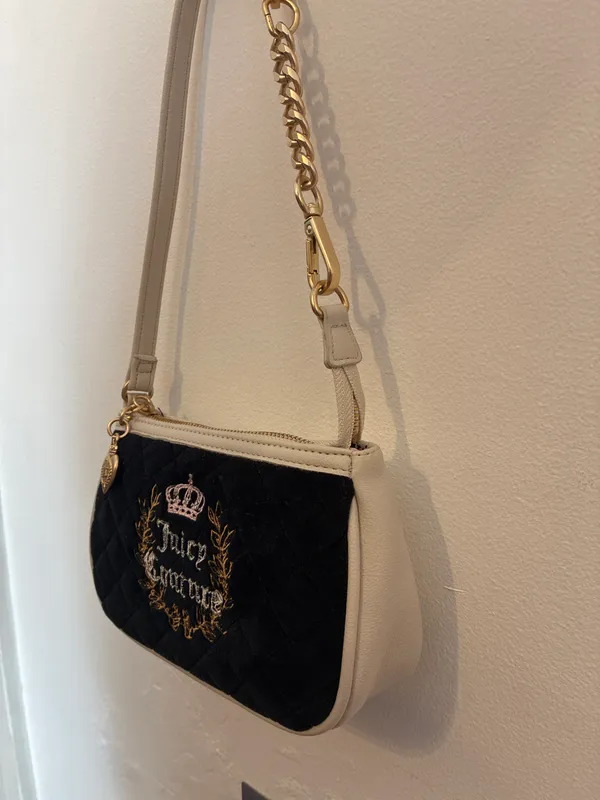 CARTERA JUICY