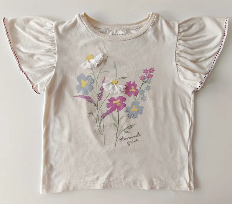 Remera manga corta. fuzarka. talle: 11 - 12.