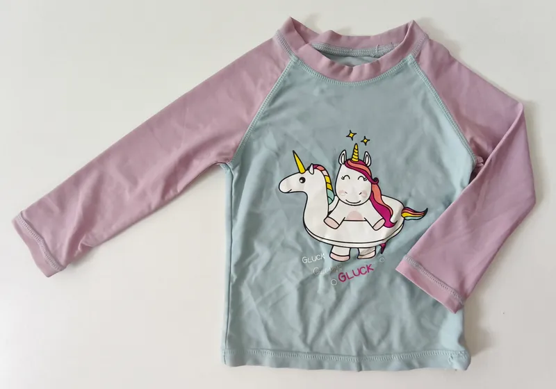 Remera manga larga. bas. talle: 9 - 12 meses.