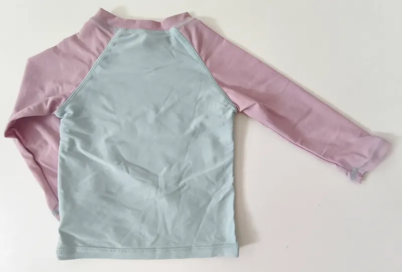 Remera manga larga. bas. talle: 9 - 12 meses.