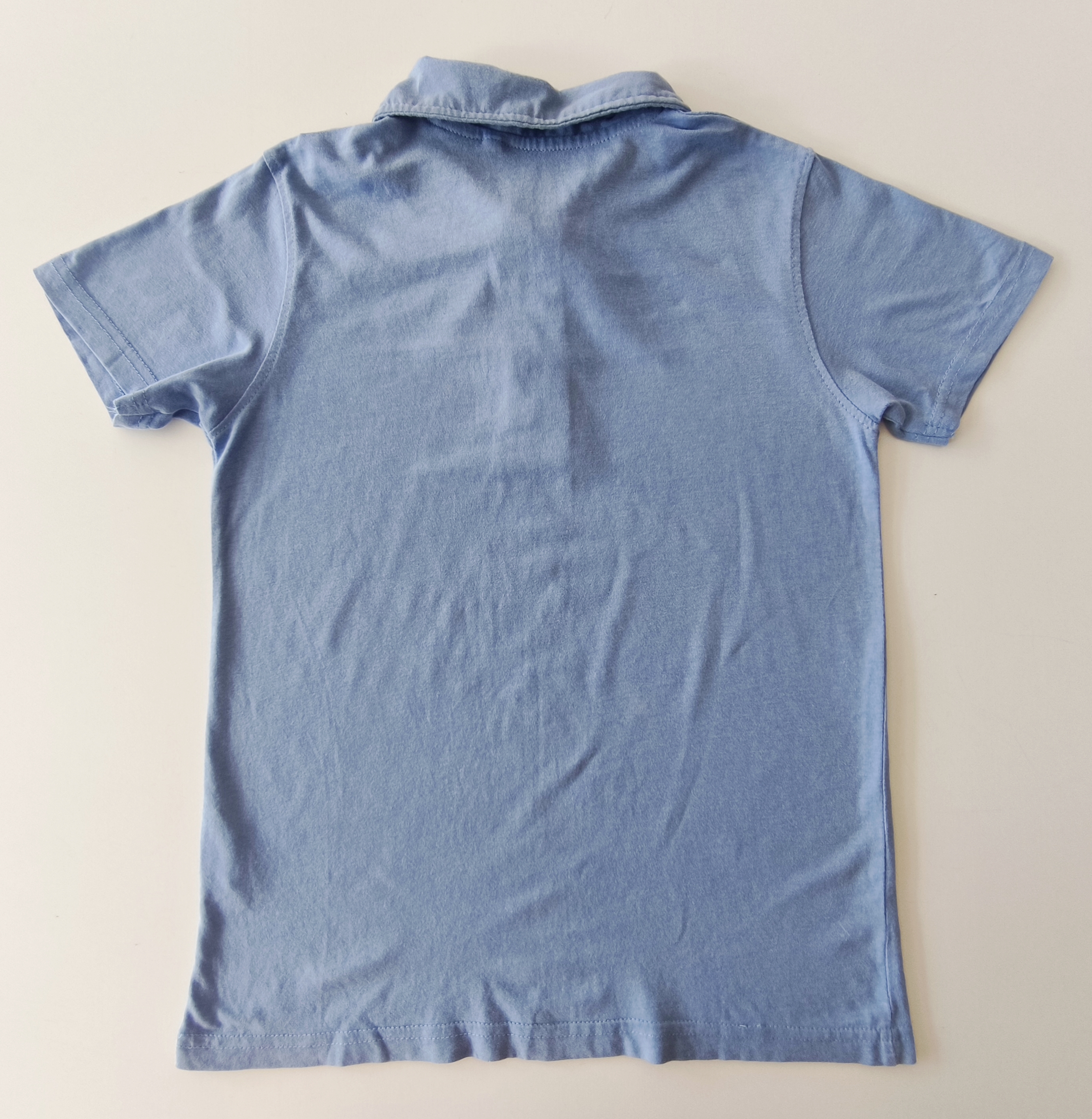 Remera manga corta. bas. talle: 10.