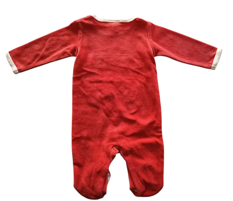 Dormilón de plush naranja con león