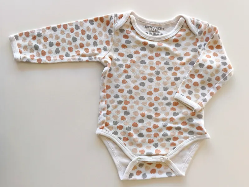 Body manga larga. Bronzini. Talle 9 - 12 meses.