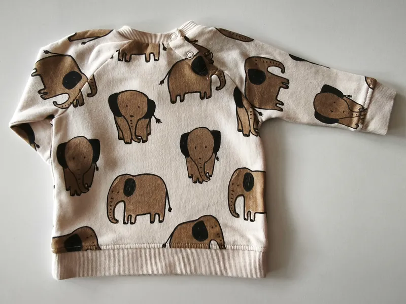 Buzo. h&m. Talle 4 - 6 meses.