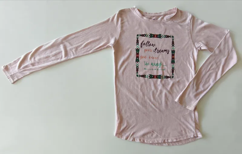 Remera manga larga. bas. Talle 12.