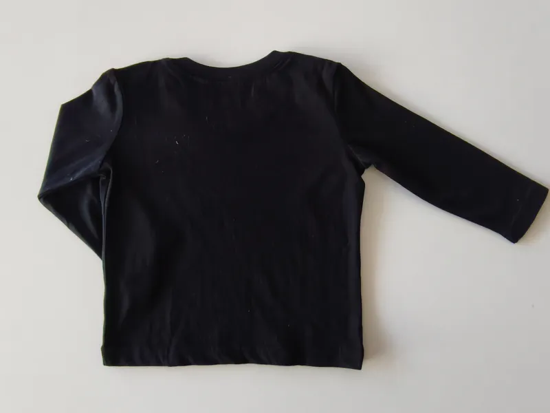 Remera manga larga. primark. Talle 6 - 12 meses.