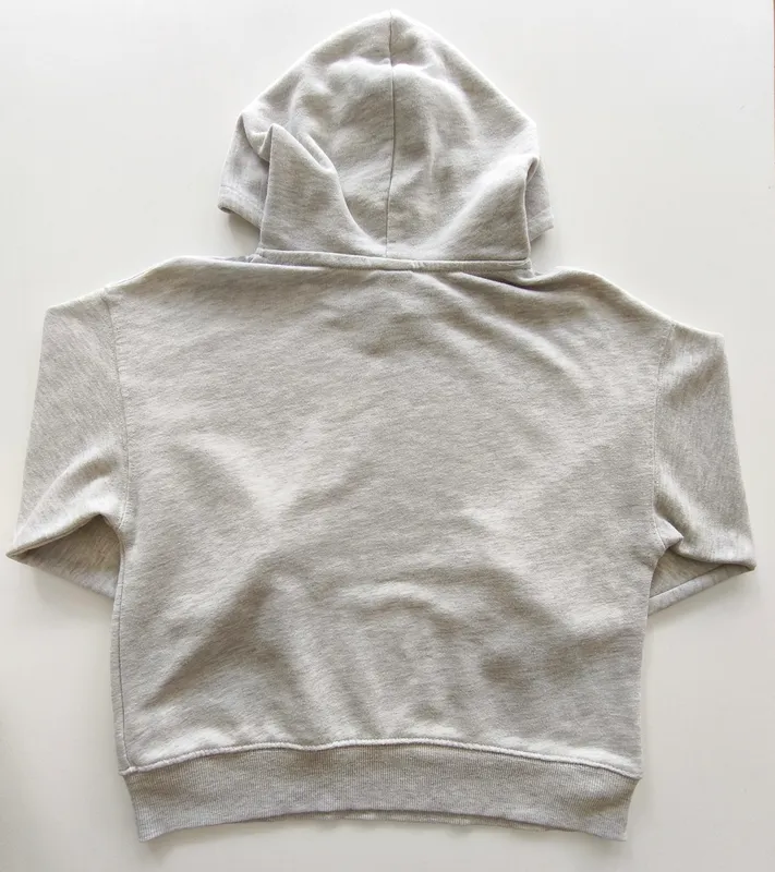Buzo canguro. zara. talle 10.