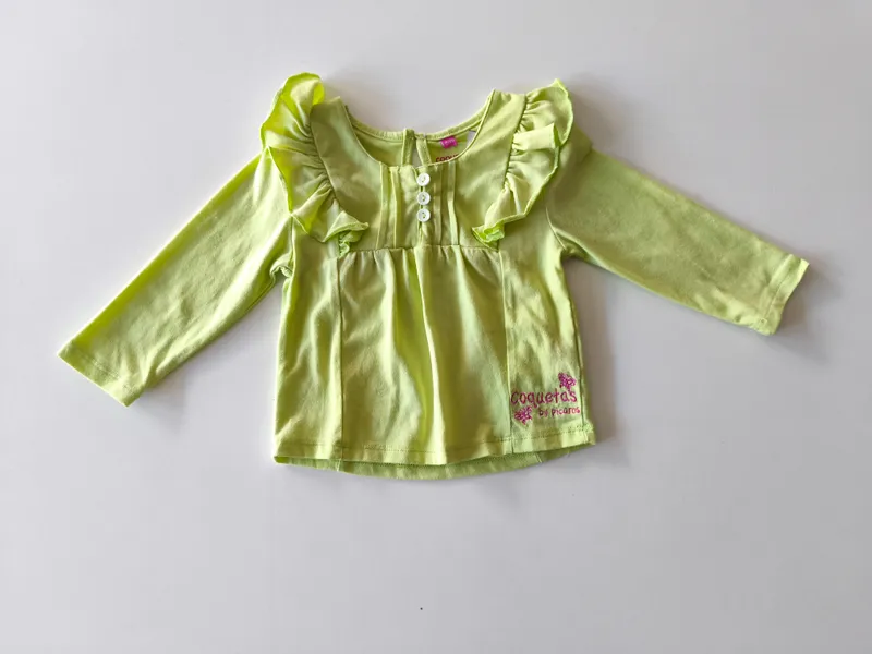 Remera manga larga. coquetas. talle 12 - 18 meses.