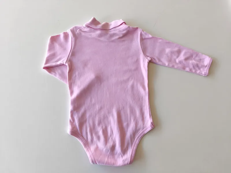 Body manga larga. cheraa. talle 12 meses.