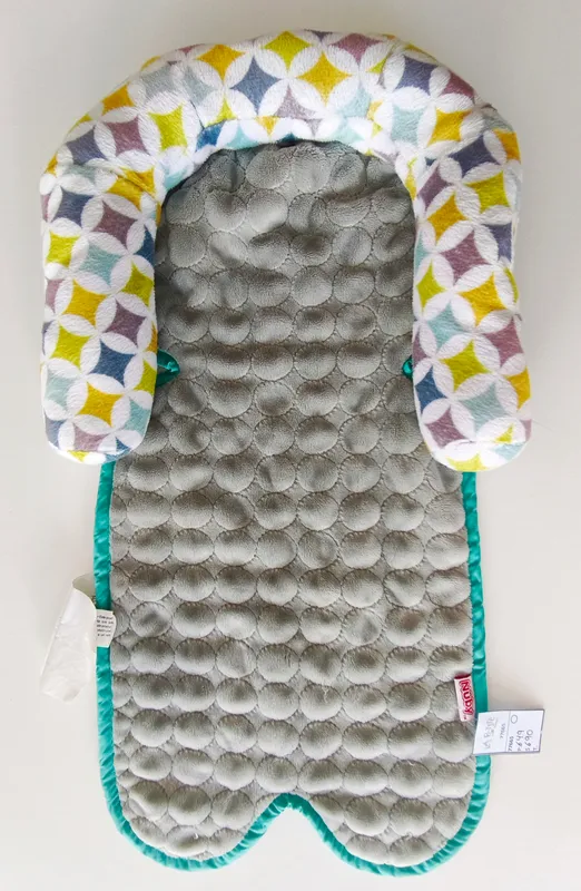 Reductor para coche o silla de auto. nuby.