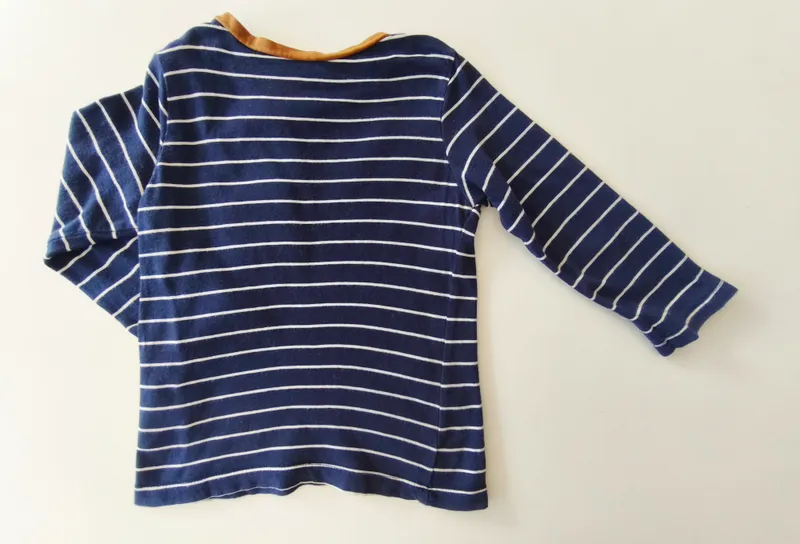 Remera manga larga. h&m. talle 6 - 9 meses.