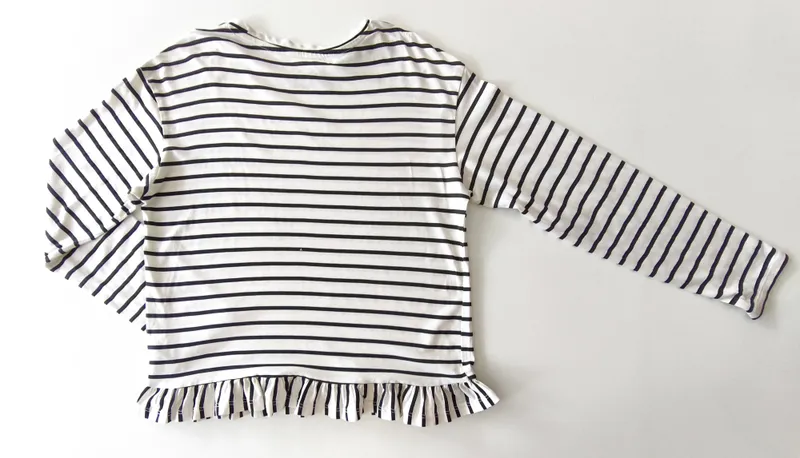 Remera manga larga. h&m. talle: 8 - 10.