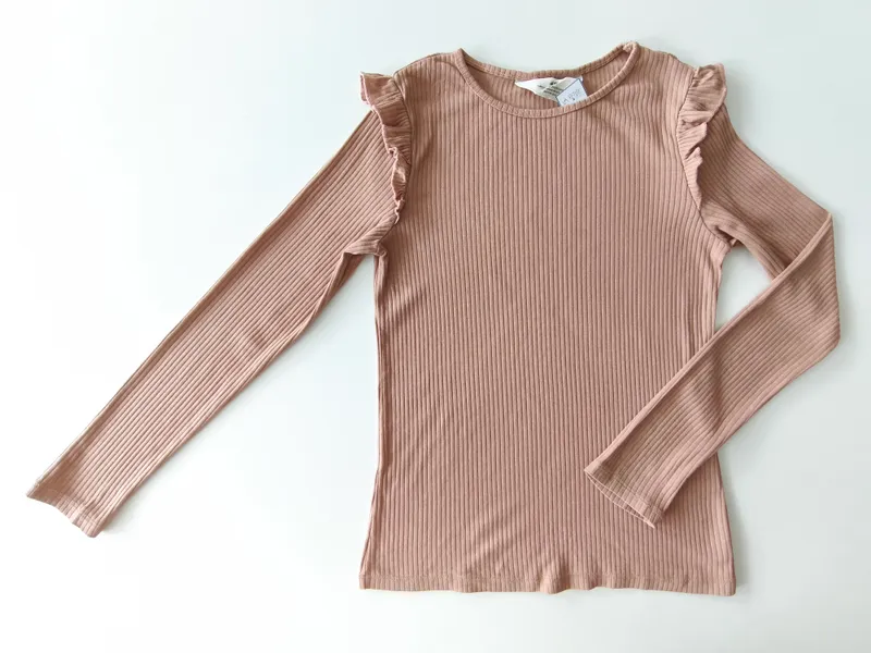 Remera manga larga. h&m. talle: 9 - 10.