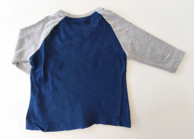 Remera manga larga. bronzini. talle: 6 - 9 meses.