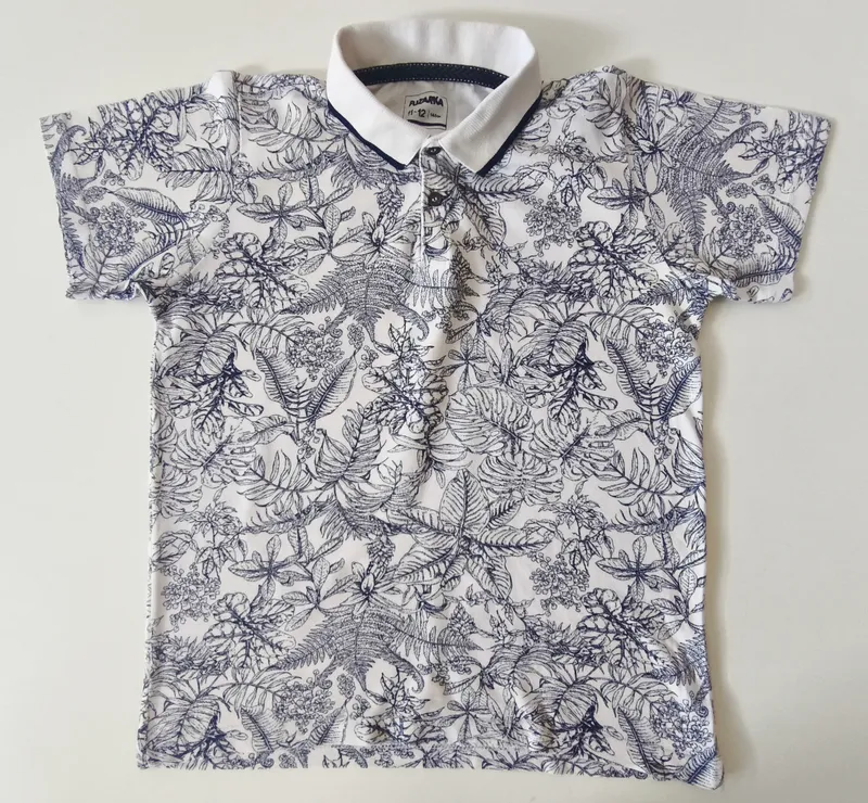 Remera manga corta. fuzarka. talle: 11 - 12.