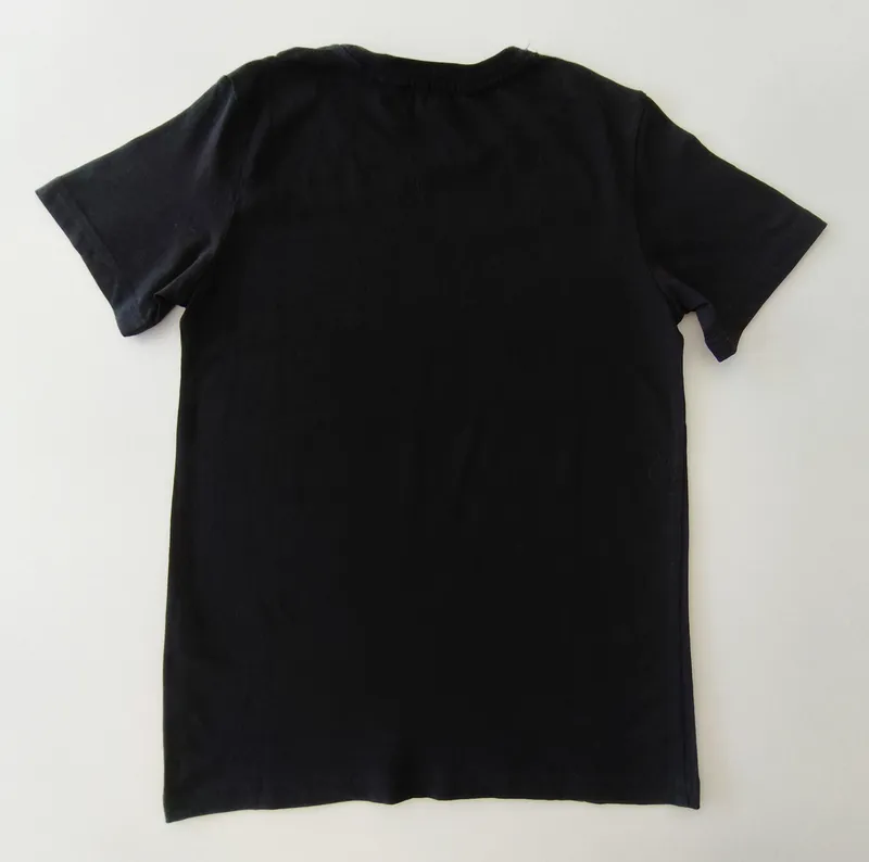 Remera manga corta. h&m. talle: 9 - 10.