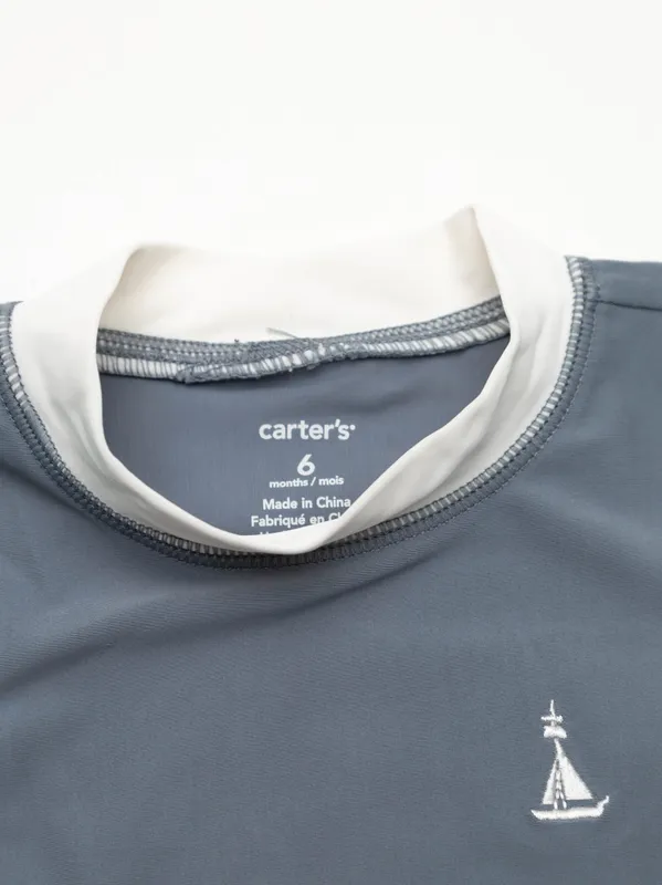 Conjunto remera y short de baño carters