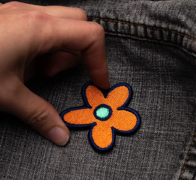 Parche muda flor naranja