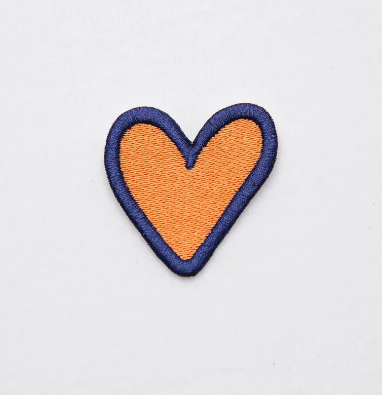Parche muda corazón naranja