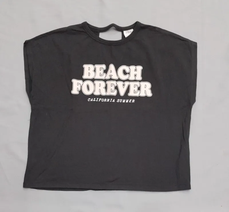 Remera zara negra estampada talle 10