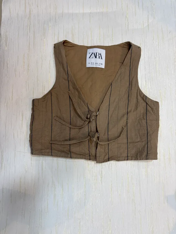 Chaleco marron zara 8-9 años