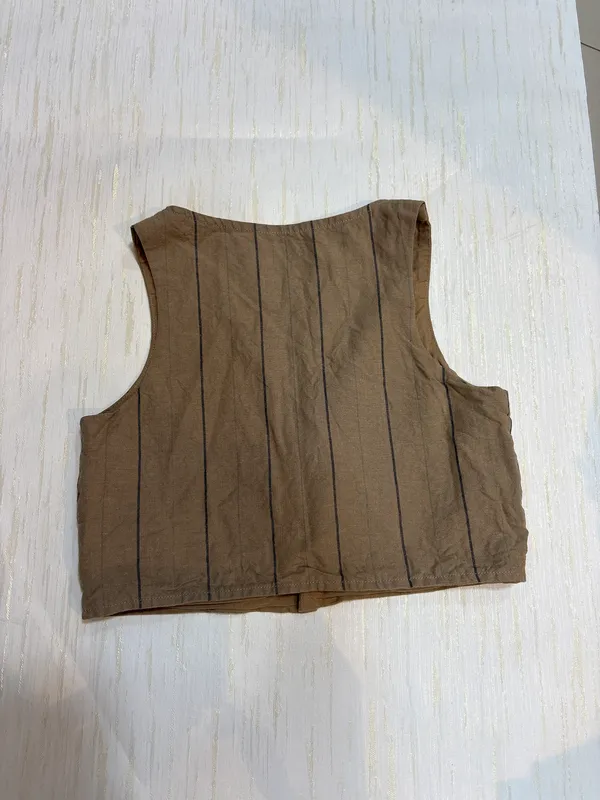 Chaleco marron zara 8-9 años