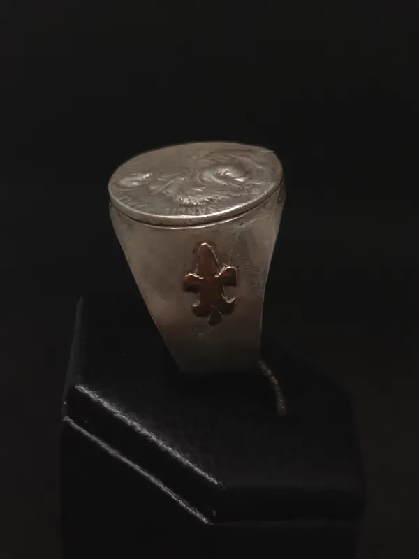 Anillo de plata con detalles en oro