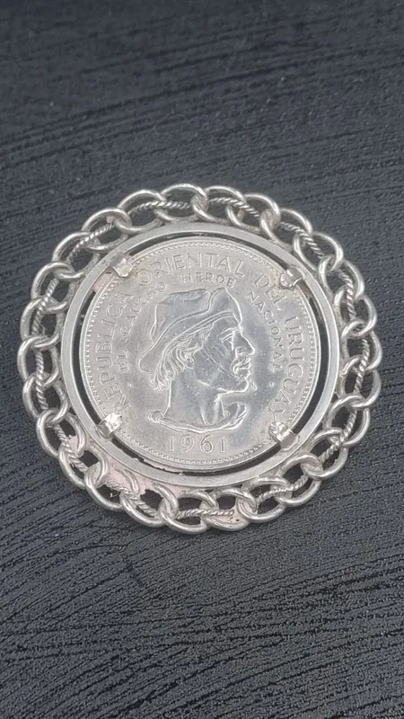Moneda de plata engarzada gaucho