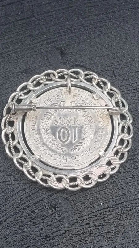 Moneda de plata engarzada gaucho
