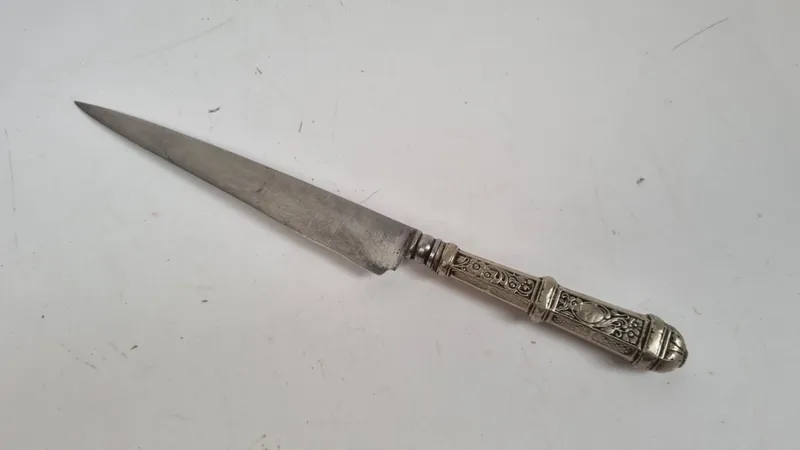 Buen cuchillo criollo el cabo de plata labrada