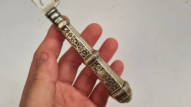 Buen cuchillo criollo el cabo de plata labrada