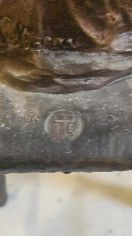 Niña juan clara de bronce