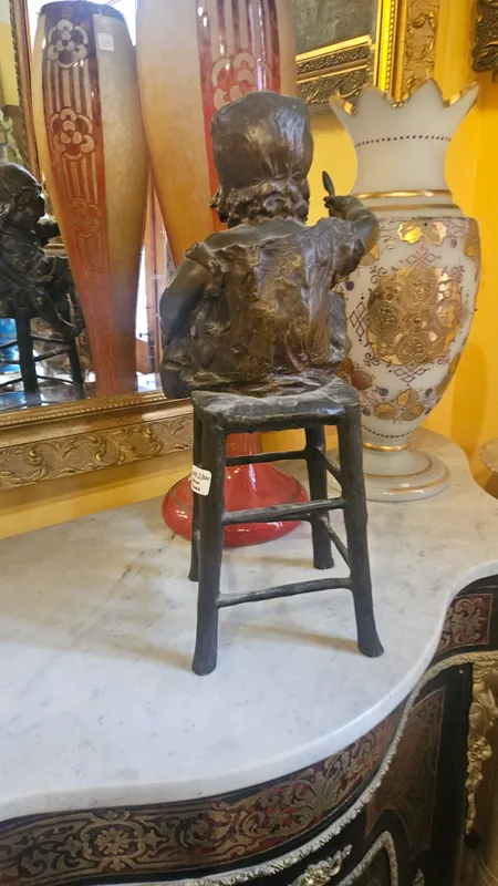 Niña juan clara de bronce